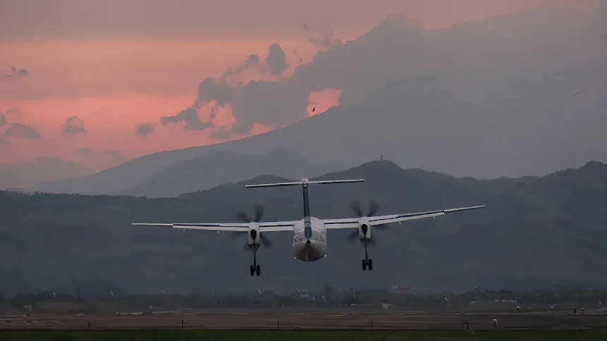 Twilight view & ANA Wings Bombardier DHC-8-Q400 Landing to Sendai Airport.
